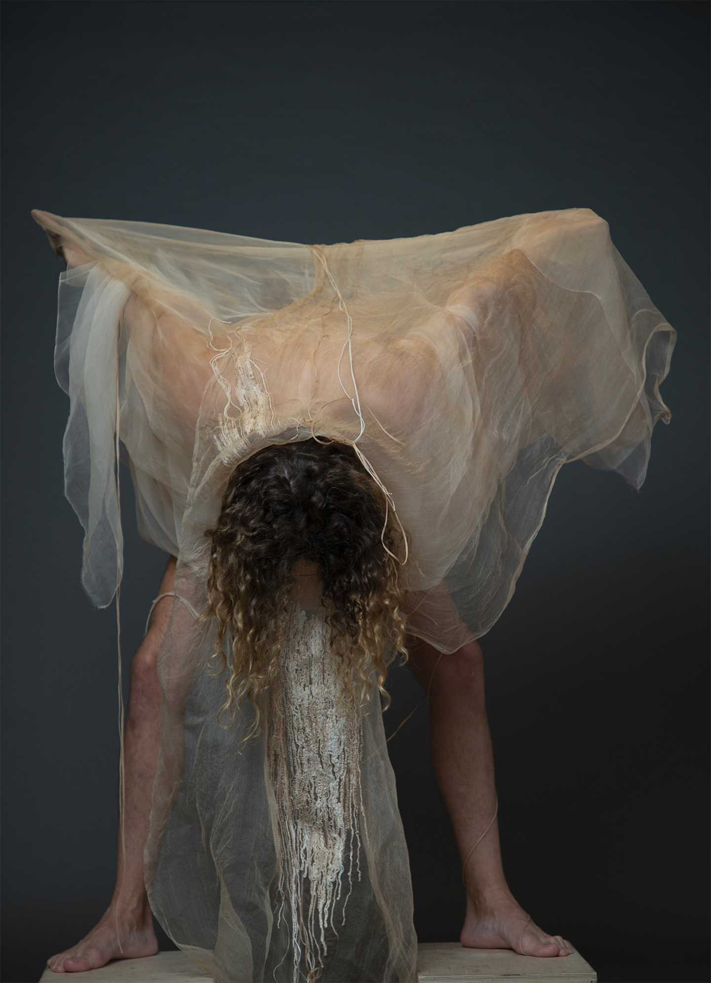 IM tutor Dr. Matteo Augello responds to Karen Spurgin’s bark-dyed embroidery through performance. Photography: IM London’s MA Photo-department