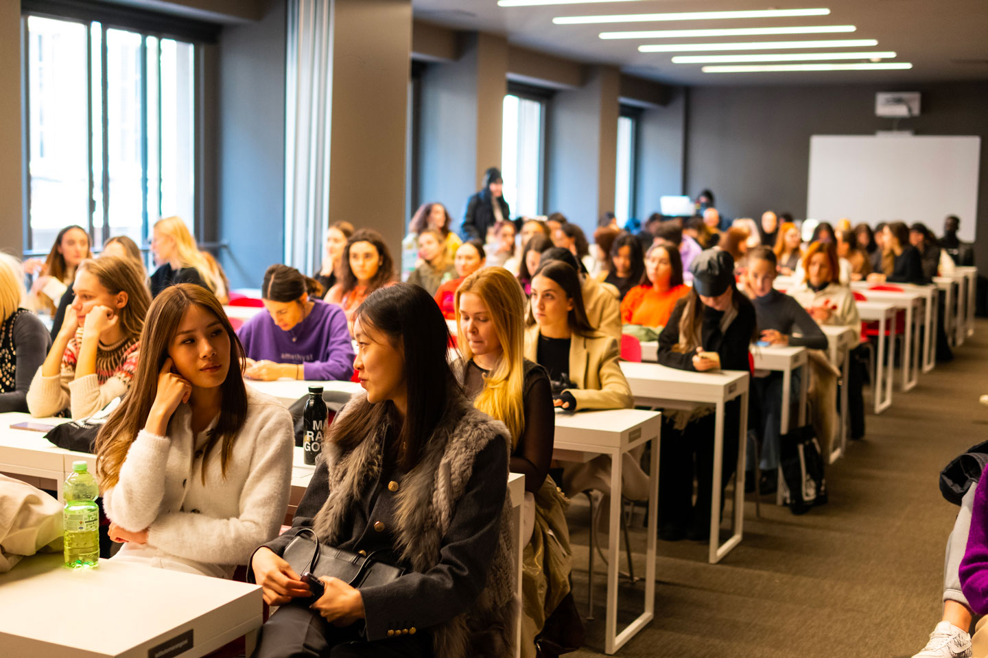 Students attending Istituto Marangoni's "In conversation with" event with artist Pietro Terzini