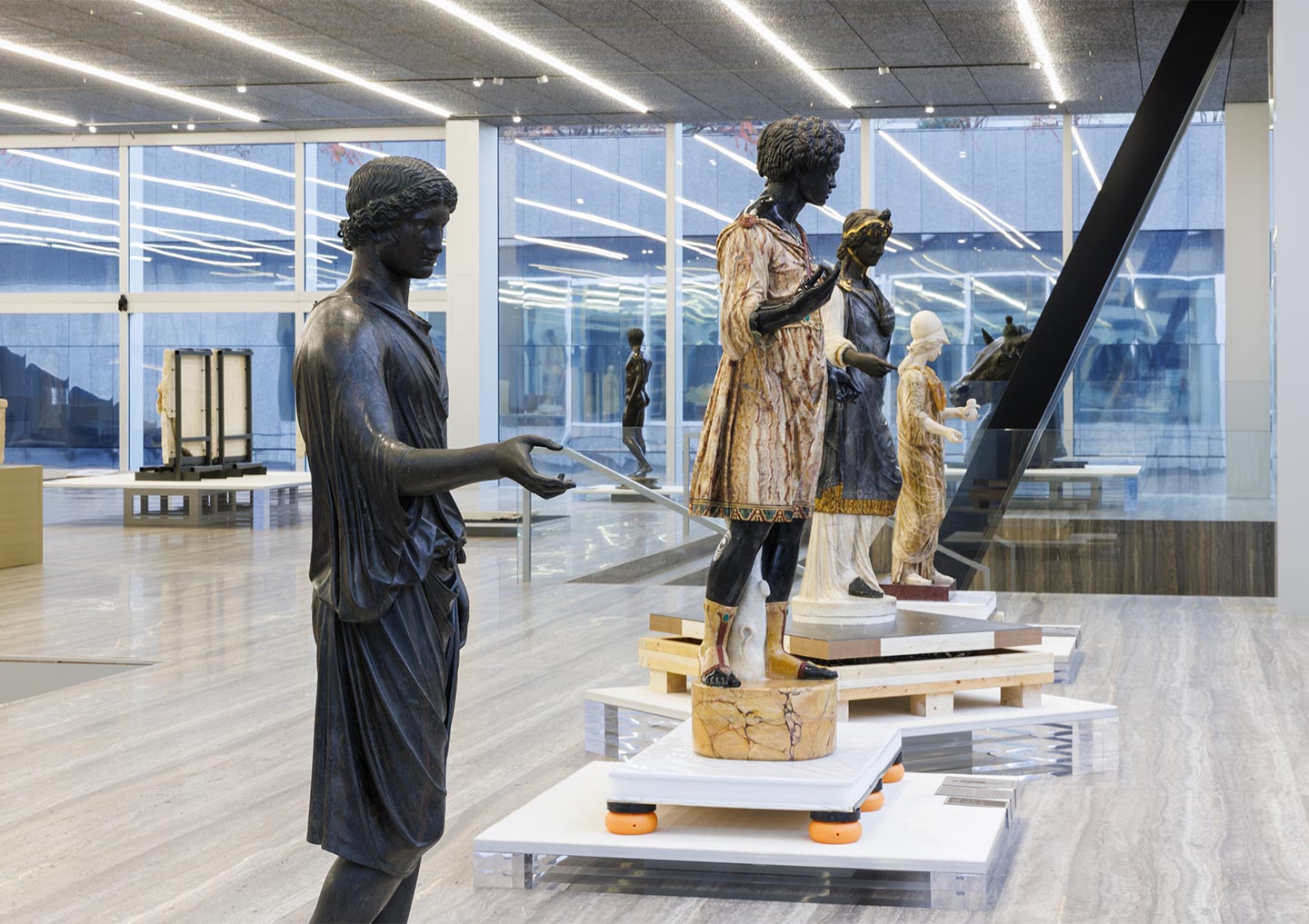 From left to right: Statue (Camillus) 1st–2nd century CE, Rome, Musei Capitolini; Nicolas Cordier, The "Borghese Moor", Between 1607 and 1612, Paris, Musée du Louvre, Départment des Antiquités greques, étrusques et romaines; Nicolas Cordier, The Gypsy Girl, 1607–1612, Re-use of an early 1st century AD statue, Rome, Galleria Borghese; The "Orsay Minerva", 1st–mid 2nd century CE, Restored by François Duquesnoy during the 1630s, Paris, Musée du Louvre, Départment des antiquités grecques, étrusques et romaine